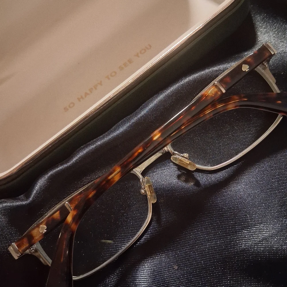 Kate Spade Rectangle Frames Tortise Shell With Pink and Black Striped Frames.